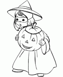 A little girl dressed as a witch with a pumpkin in her hand